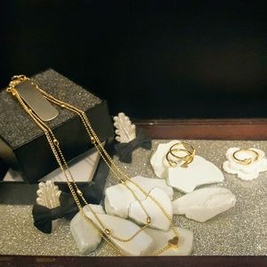 Gold necklace and 3 ring set
